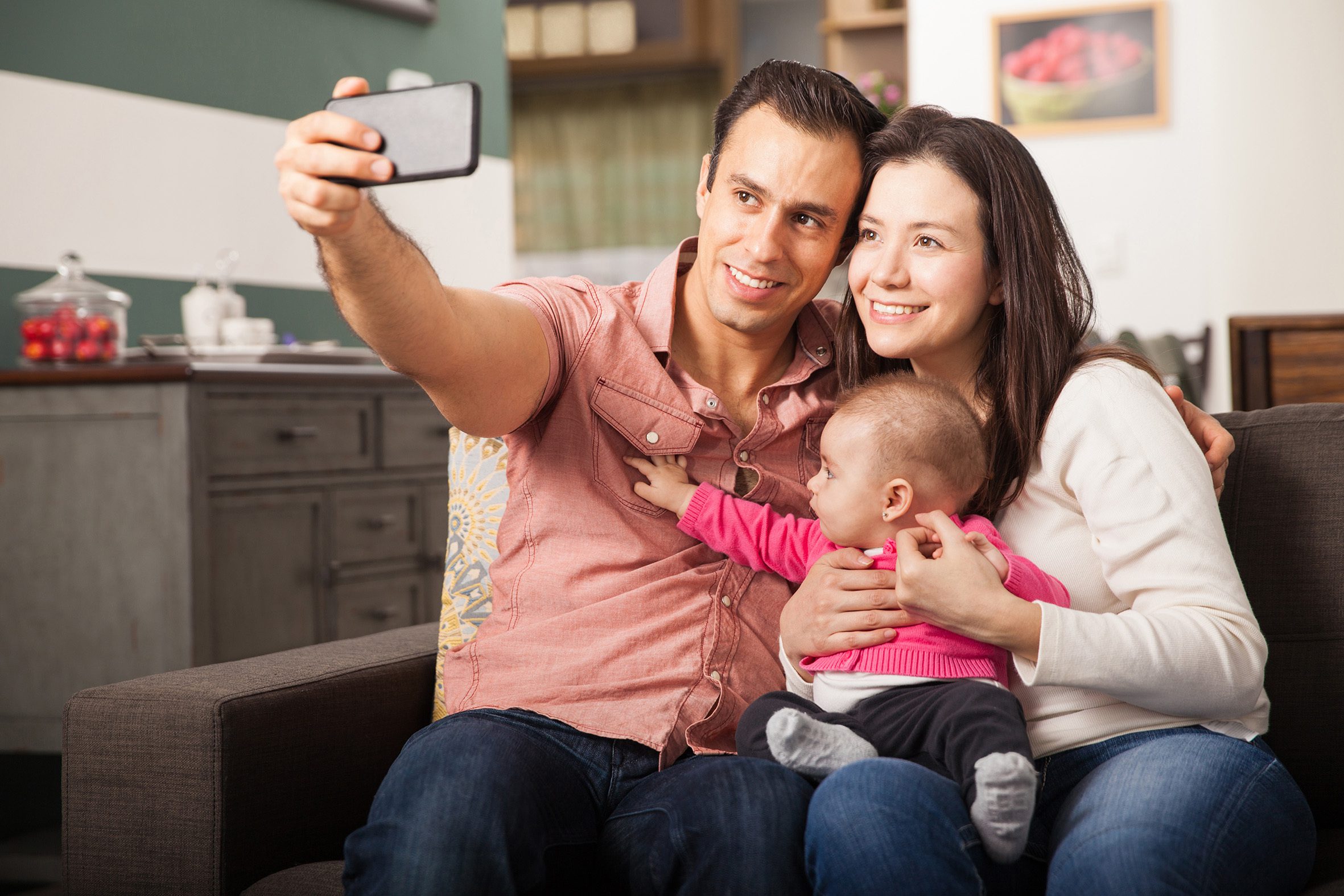 Happy,Latin,Couple,Taking,A,Selfie,Of,Themselves,With,Their